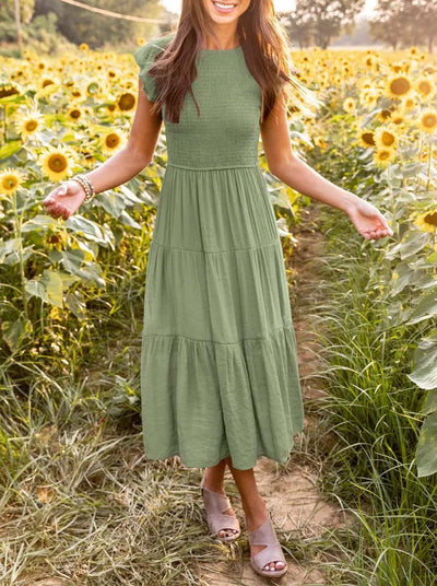 Sara® | Plissiertes und gesmoktes Sommerkleid „Marguerite“.