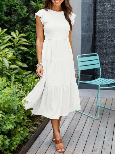 Sara® | Plissiertes und gesmoktes Sommerkleid „Marguerite“.