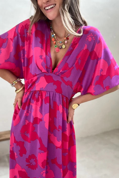 Paisley® | Rosafarbenes Dolman-Maxikleid mit abstraktem Blumendruck und V-Ausschnitt
