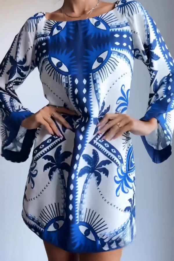 Ava® | Blaues Minikleid mit Mysterious Eyes-Print