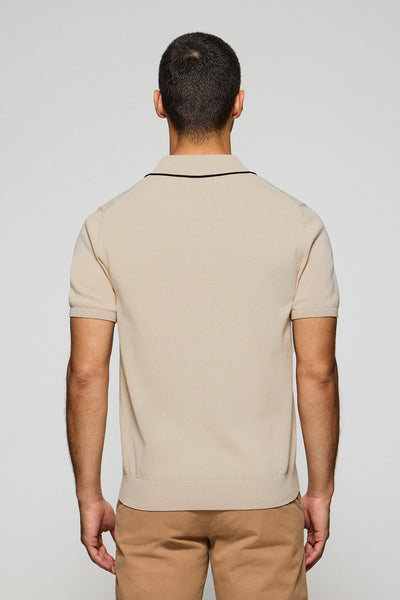 Polo beige de punto con botones