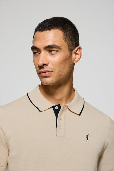 Polo beige de punto con botones