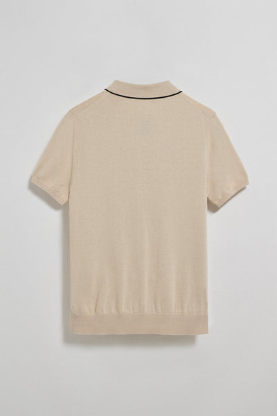 Polo beige de punto con botones