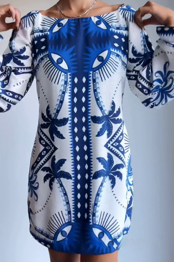 Ava® | Blaues Minikleid mit Mysterious Eyes-Print