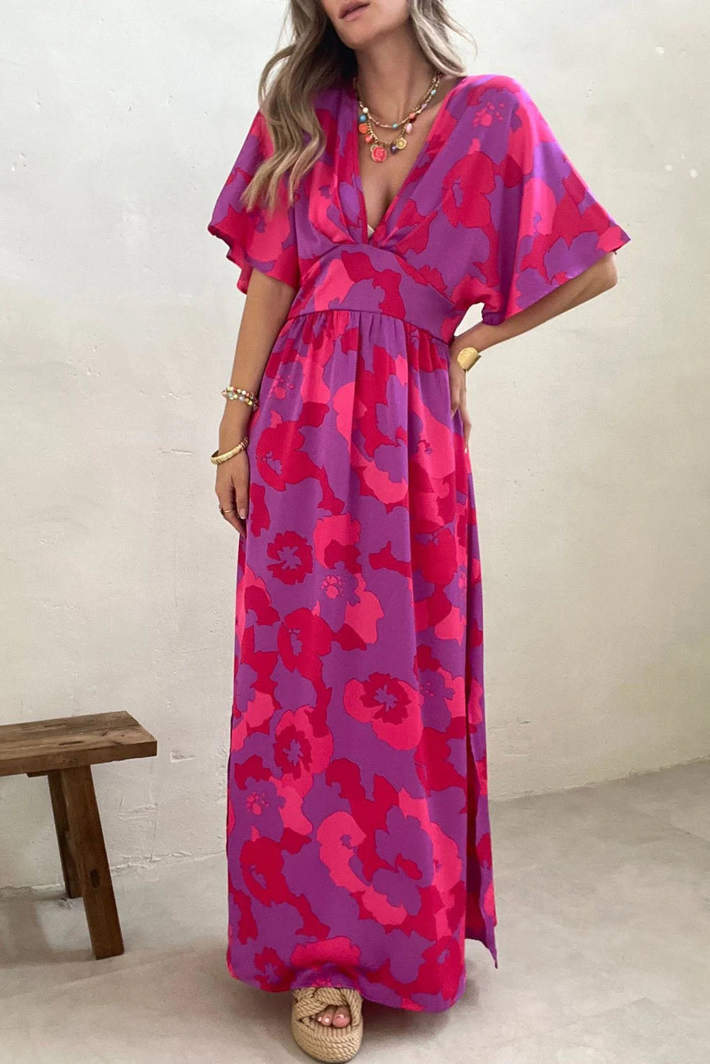 Paisley® | Rosafarbenes Dolman-Maxikleid mit abstraktem Blumendruck und V-Ausschnitt