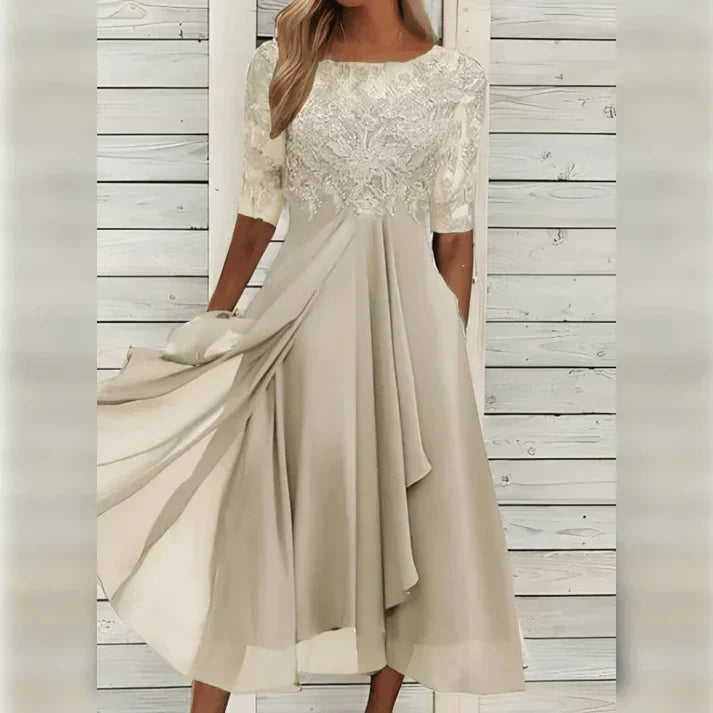 Elegantes Kleid mit Spitzenoberteil | Halblange Ärmel | Fließender Rockteil