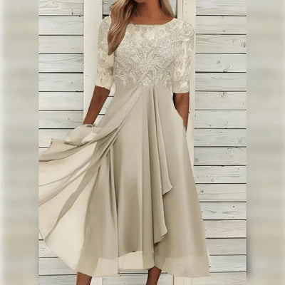 Elegantes Kleid mit Spitzenoberteil | Halblange Ärmel | Fließender Rockteil