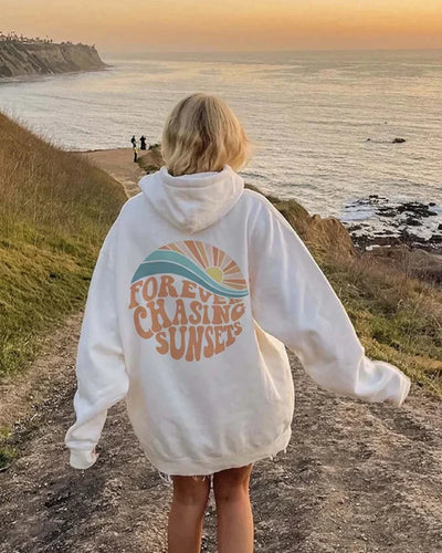 Kira – bequemer kapuzenpullover, der immer den sonnenuntergängen nachjagt