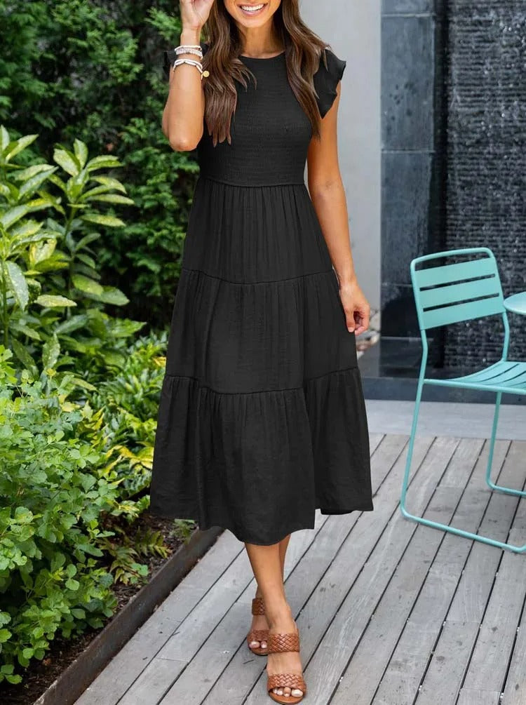 Sara® | Plissiertes und gesmoktes Sommerkleid „Marguerite“.
