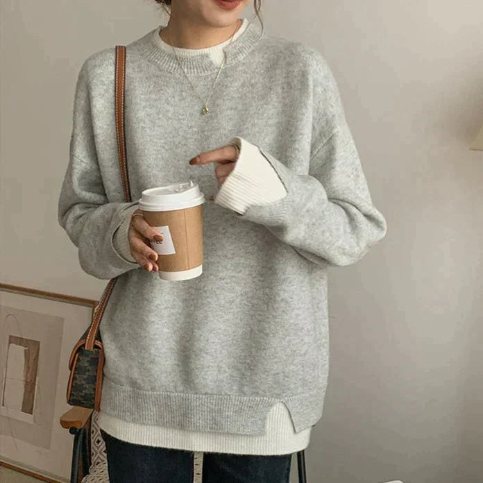 Grau-weißer pullover