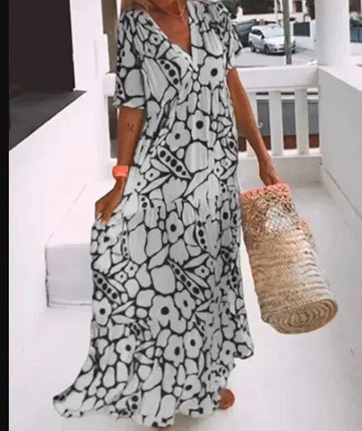 Maxikleid mit Blumenmuster | V-Ausschnitt | Weit schwingender Schnitt